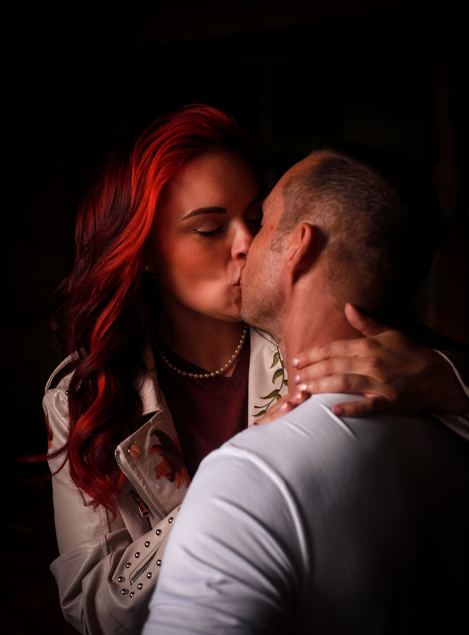 Redhead kissing partner.