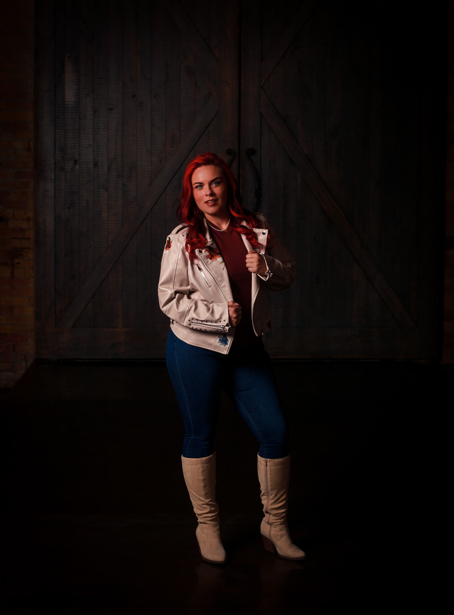 Redhead boss babe with leather jacket.