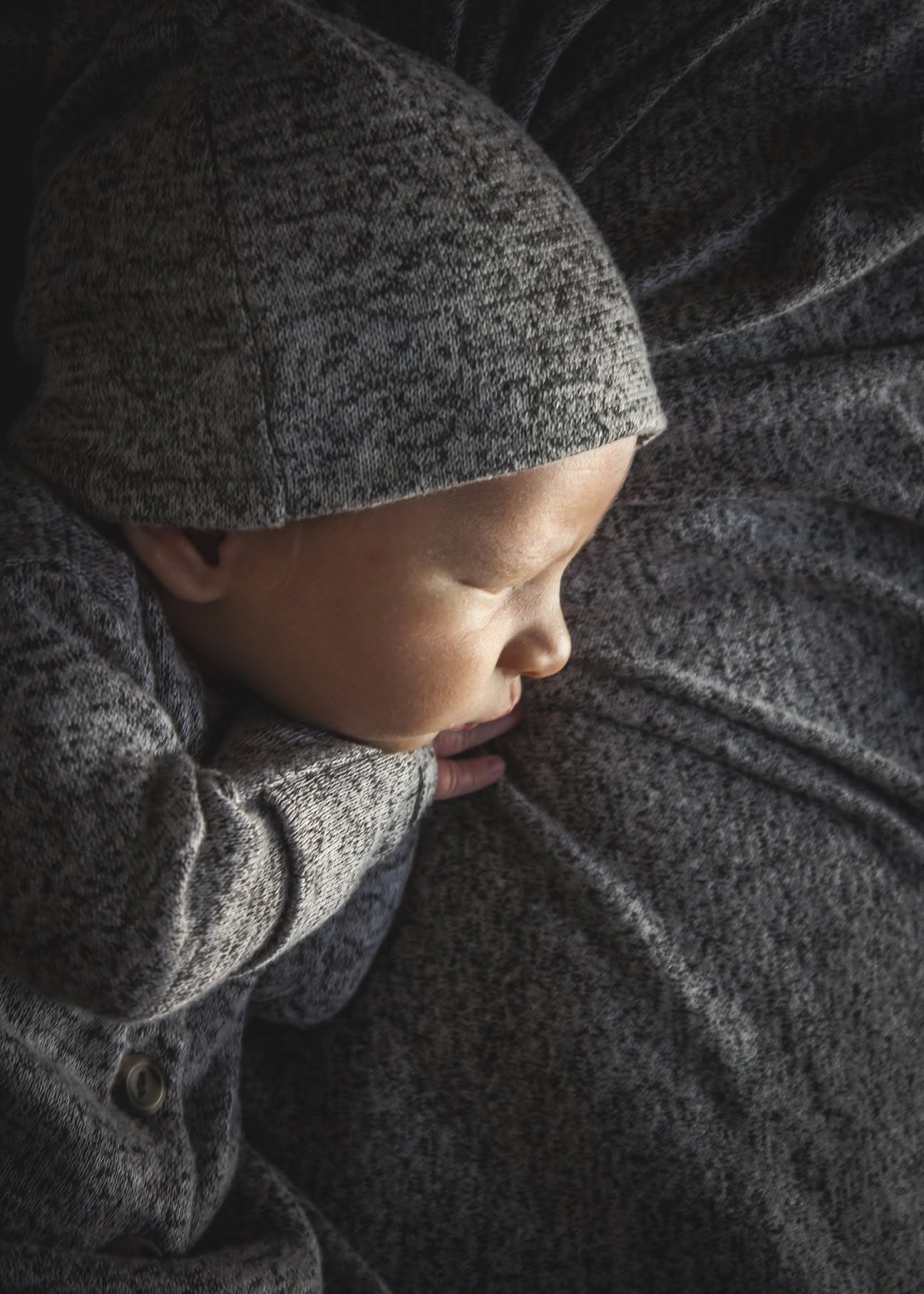 Baby boy in grey.